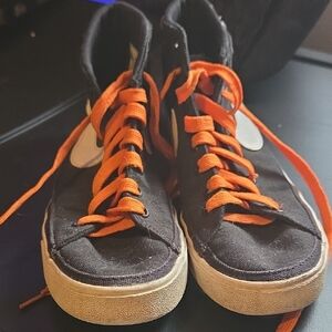 Nike Sneakers with Bright Orange Accents